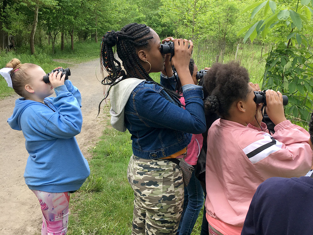 Woodland Hills students with binoculars
